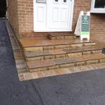 Black Tarmac Driveway with stone steps