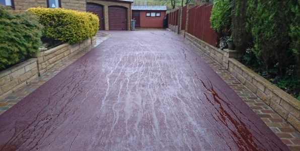 red tarmac drive after