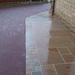 red tarmac drive after with indian stone flags