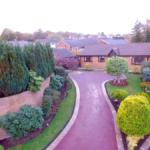 red tarmac drive indian stone border 